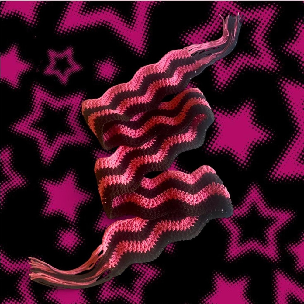 crochet pink and black wavy scarf with tassel fringe
